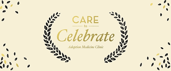 A rectangular illustration with a golden background and scatter pattern leaves in the corners. Centered text reading "Care to Celebrate Adoption Medical Clinic" rests between two illustrated laurel branches in black.