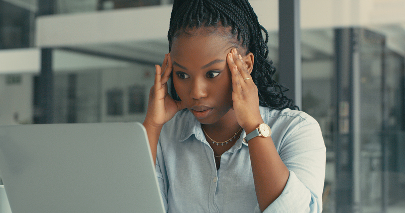 concerned employee looking at the computer